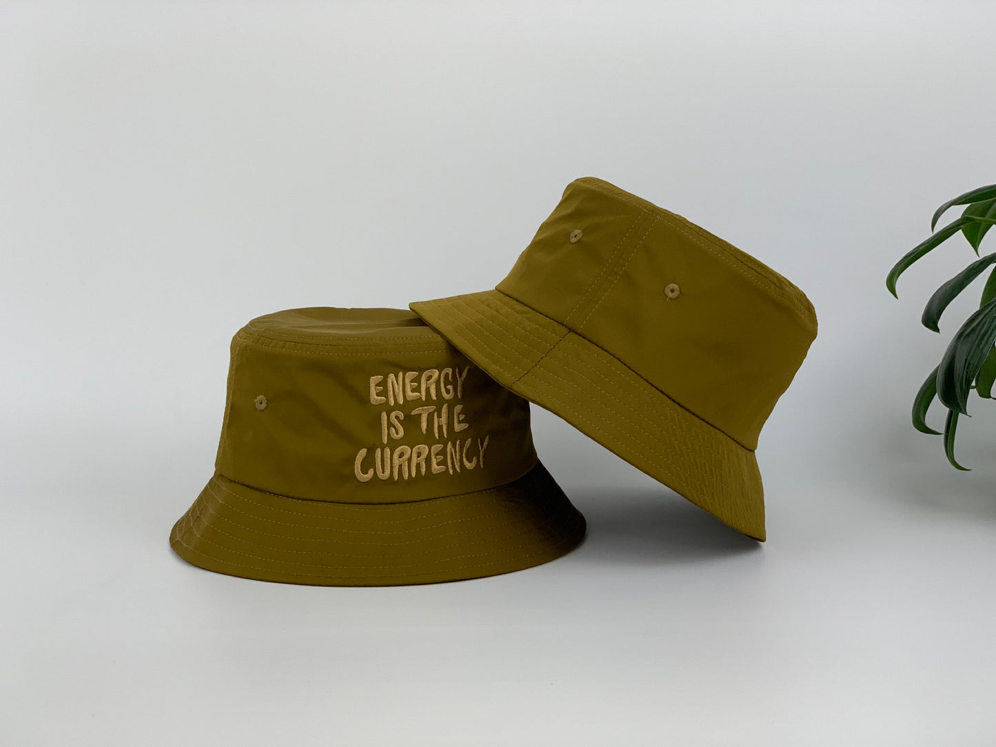 Energy is the Currency Bucket Hat in Star fruit